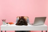 Young frustrated exhausted woman laid her head down on the table sit work at white desk with contemporary pc laptop isolated on pastel pink background. Achievement business career concept. Copy space. Young frustrated exhausted woman laid her head down on the table sit work at white desk with contemporary pc laptop isolated on pastel pink background. Achievement business career concept. Copy space.